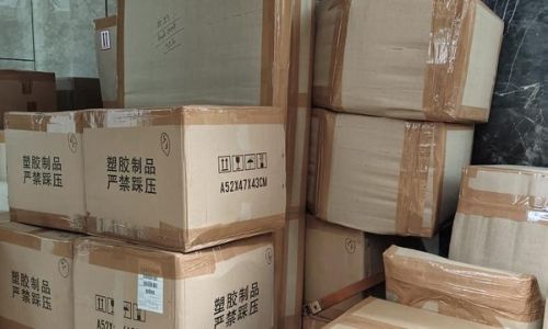 Cardboard carton with a folding table, labeled and numbered by our packers movers team for inventory check